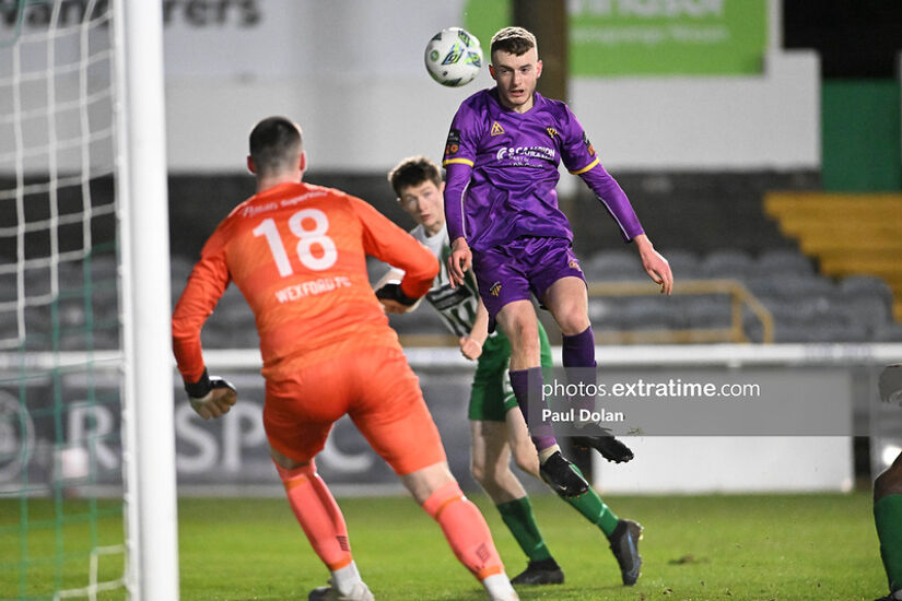 Reece Webb clears under pressure from a Bray Wanderers attack