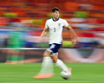 John Stones of England runs with the ball during the UEFA EURO 2024 semi-final match between Netherlands and England at Football Stadium Dortmund on July 10, 2024 in Dortmund, Germany.