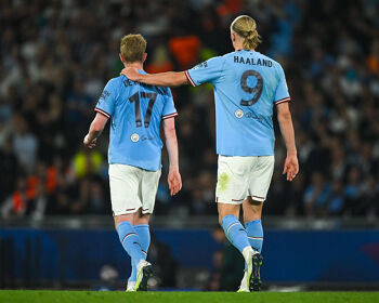 Kevin De Bruyne of Manchester City with his teammate Erling Haaland