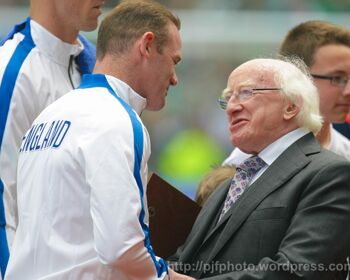 England captain Wayne Rooney is greeted by Ireland president Michael D Higgins ahead of a 2015 friendly at the Aviva Stadium.