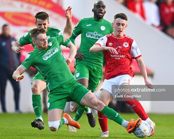Rob Slevin challenging Darragh Burns during Finn Harps' trip to take on St. Pat's in April 2022