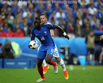 Moussa Sissoko of France and Gylfi Sigurdsson of Iceland in action in the EURO 2016 Quarter-Final at Stade de France