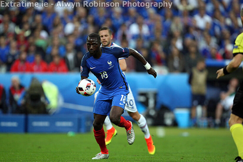 Moussa Sissoko of France and Gylfi Sigurdsson of Iceland in action in the EURO 2016 Quarter-Final at Stade de France