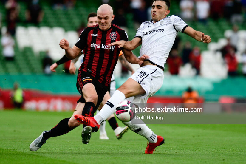 Georgie Kelly challenges Giannis Michailidis for the ball at the Aviva Stadium on Tuesday, 3 August 2021.