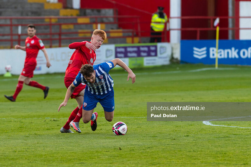 Shane Farrell of Shelbourne fouls Treaty United's Clyde O'Connell