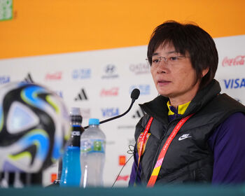 Shui Qingxia, Head Coach of China PR, speaks to the media in the post match press conference