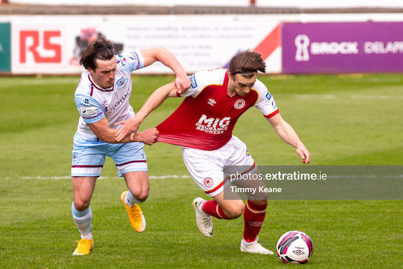 Matty Smith of St Patrick's Athletic in action against James Brown of Drogheda United 