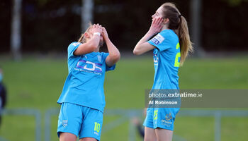 Katie Malone of DLR Waves FC and Shauna Carroll of DLR Waves FC reaction after seeing the ball fly over