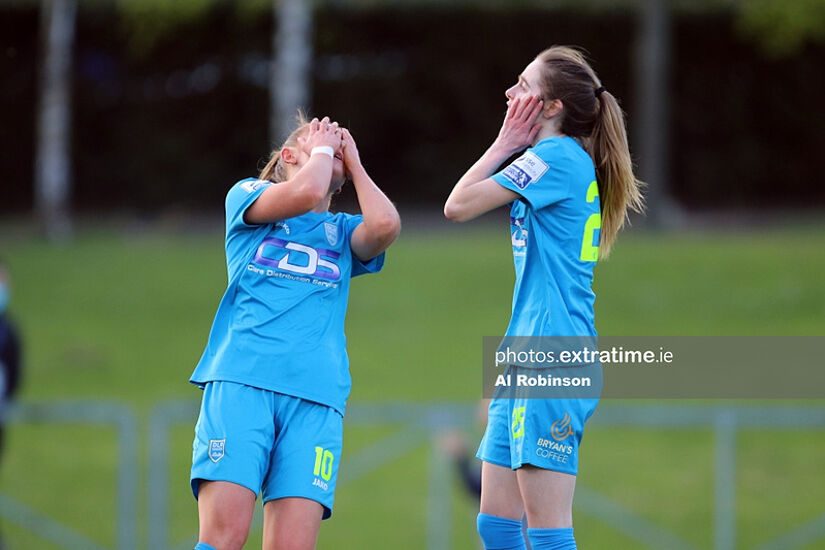 Katie Malone of DLR Waves FC and Shauna Carroll of DLR Waves FC reaction after seeing the ball fly over