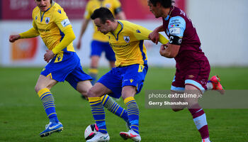 Longford Town FC's Dylan Grimes and James Brown of Drogheda United in action during this evening's fixture.