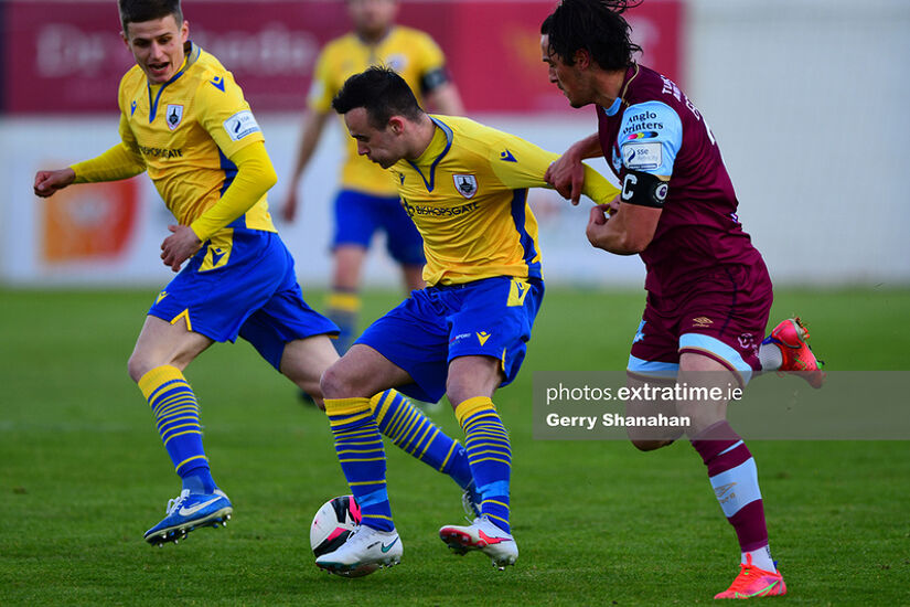 Longford Town FC's Dylan Grimes and James Brown of Drogheda United in action during this evening's fixture.