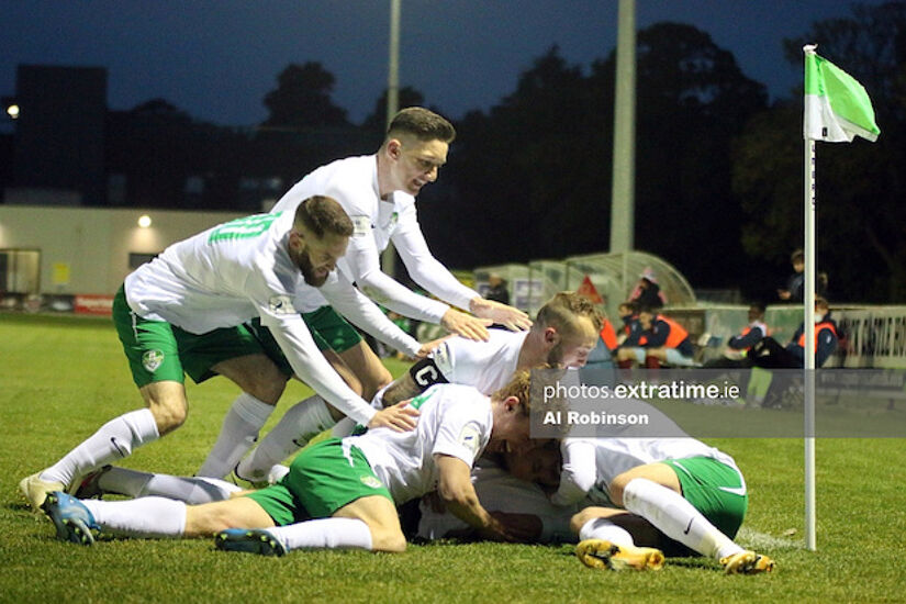 eam mates celebrate with Mitchell Byrne of Cabinteely FC after his late winner.