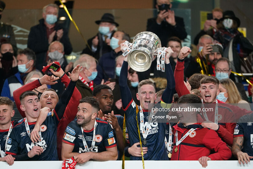 Ian Bermingham lifts the cup for St Patrick's Athletic 