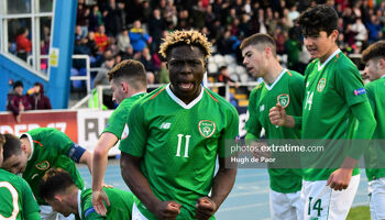 Festy Ebosele celebrates a Republic of Ireland goal during a 2019 under-17 European Championships game with the Czech Republic.