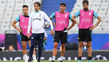 Lautaro Martinez (left) and Head Coach Simone Inzaghi look on during the Internazionale training session ahead of UEFA Champions League