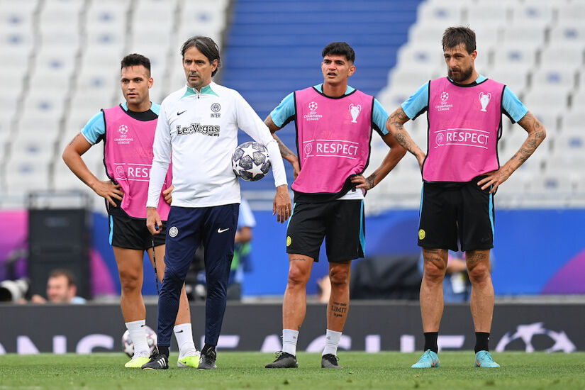 Lautaro Martinez (left) and Head Coach Simone Inzaghi look on during the Internazionale training session ahead of UEFA Champions League