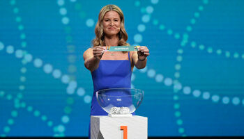 Maia Jackman holds up the card for Australia during the FIFA Women's World Cup 2023 Final Tournament Draw at Aotea Centre in Auckland