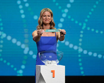 Maia Jackman holds up the card for Australia during the FIFA Women's World Cup 2023 Final Tournament Draw at Aotea Centre in Auckland