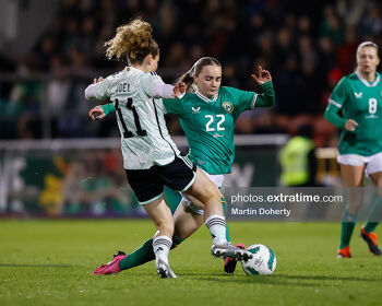 Izzy Atkinson of Irelandchallenged by Lois Joel of Cymru in the game in Tallaght on 27 February 2024