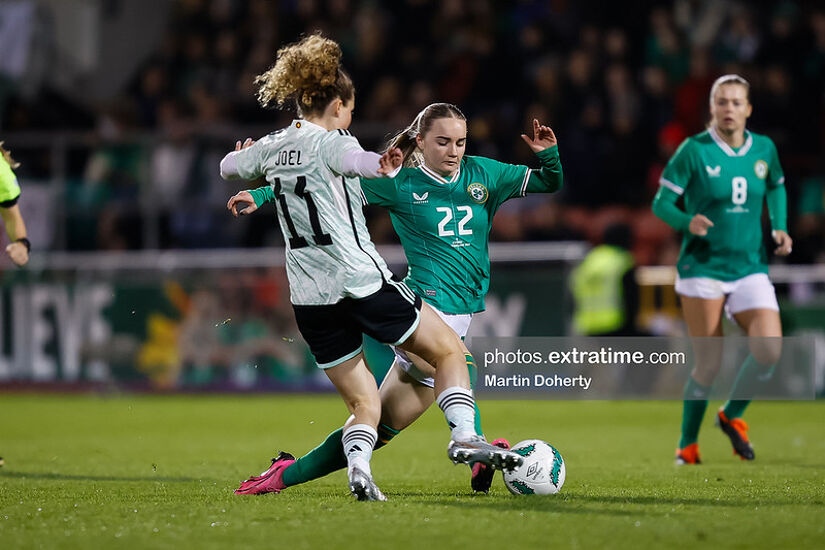 Izzy Atkinson of Irelandchallenged by Lois Joel of Cymru in the game in Tallaght on 27 February 2024