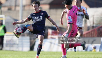 Matty Smith of Saint Patrick's Athletic attempts to lob James Talbot of Bohemian 
