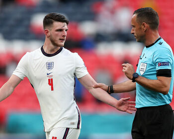 Referee Artur Dias speaking with former Republic of Ireland international Declan Rice during the UEFA Euro 2020 Championship Group D match between England and the Czech Republic at Wembley Stadium in June 2021.