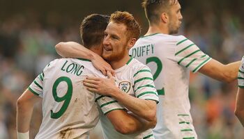 Stephen Quinn embraces Robbie Keane following a 1-1 friendly draw with the Netherlands before Euro 2016.