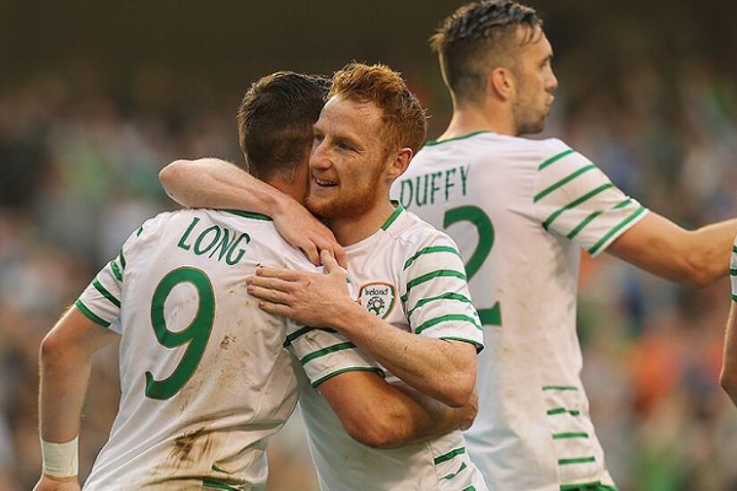 Stephen Quinn embraces Robbie Keane following a 1-1 friendly draw with the Netherlands before Euro 2016.