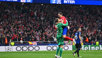 Jan Oblak and Cesar Azpilicueta of Atletico Madrid celebrate following the team's victory in the penalty shoot out during the UEFA Champions League 2023/24 round of 16 second leg match against Inter Milan