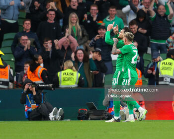 Troy Parrott celebrates scoring his last-minute goal for the Boys in Green against Hungary with Sammie Szmodics (right)