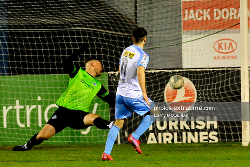 Dan Hawkins opens the scoring for Shelbourne, smashing the ball past Colin McCabe during their 2-0 win over Drogheda United at Head in the Game Park on Friday, 25th February 2022.