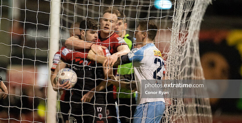 Ryan Cassidy Bohemian FC retrieves the ball from the Shels net after Bohemian equaliser