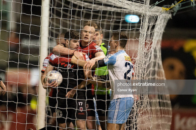 Ryan Cassidy Bohemian FC retrieves the ball from the Shels net after Bohemian equaliser