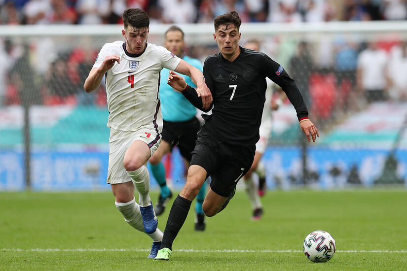 Kai Havertz of Germany battles for possession with Declan Rice of England