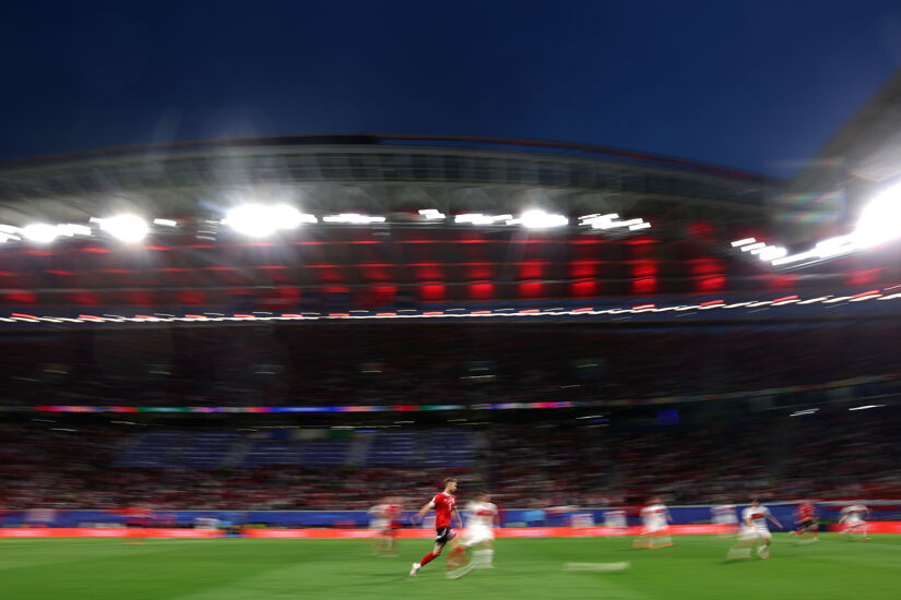A general view as Stefan Posch of Austria passes the ball during the UEFA EURO 2024 round of 16 match between Austria and Turkiye at Football Stadium Leipzig on July 02, 2024 in Leipzig, Germany.