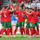 Cristiano Ronaldo of Portugal celebrates his team's second goal with teammates after Samet Akaydin of Turkiye (not pictured) scores an own goal during the UEFA EURO 2024 group stage match between Turkiye and Portugal at Football Stadium Dortmund