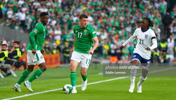 Jason Knight on the ball for Ireland against England, with Three Lions man Ebereche Eze (right) and Boys in Green man Chiedozie Ogbene (left)