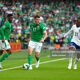 Jason Knight on the ball for Ireland against England, with Three Lions man Ebereche Eze (right) and Boys in Green man Chiedozie Ogbene (left)