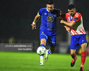 Enda Curran (right) in action for Treaty United against Waterford's Ronan Coughlan in 2023