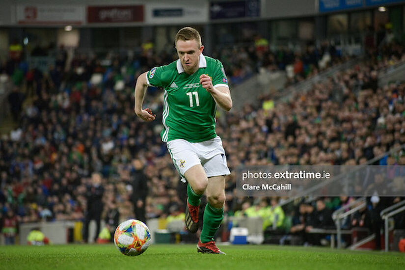 Shane Ferguson in action for Northern Ireland against Estonia in 2019