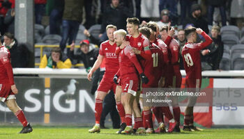 Dylan McGlade of Cork City celebrates his hat-trick with team mates