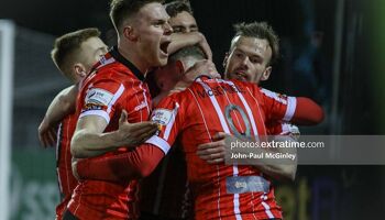 Derry City players celebrate a goal during their 2-2 draw with Dundalk at Oriel Park on Friday, 18 February 2022.