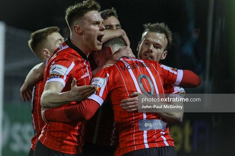 Derry City players celebrate a goal during their 2-2 draw with Dundalk at Oriel Park on Friday, 18 February 2022.