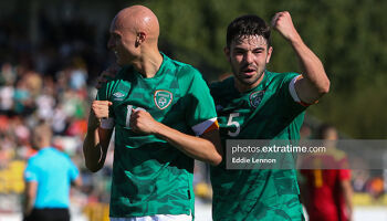 Eiran Cashin (right) joins goalscorer Will Smallbone in celebrating Ireland's opener against Montenegro