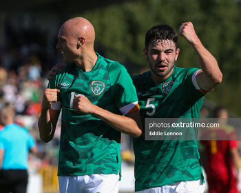 Eiran Cashin (right) joins goalscorer Will Smallbone in celebrating Ireland's opener against Montenegro