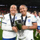 Lucy Bronze and Lauren James of England celebrate with the Women’s Finalissima trophy after the team’s victory in the penalty shoot out during the Women´s Finalissima 2023 match between England and Brazil at Wembley Stadium on April 06, 2023.