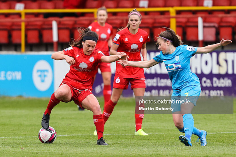 Ciara Grant of Shelbourne FC tackled by Rachel Doyle of DLR Waves