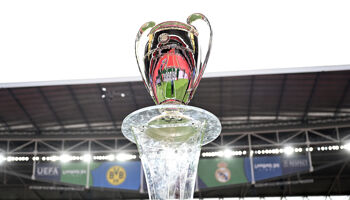 A detailed view of the UEFA Champions League trophy is seen on a plinth prior to the UEFA Champions League 2023/24 final match between Borussia Dortmund and Real Madrid CF at Wembley Stadium on May 31, 2024 in London, England.