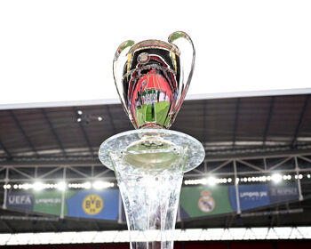 A detailed view of the UEFA Champions League trophy is seen on a plinth prior to the UEFA Champions League 2023/24 final match between Borussia Dortmund and Real Madrid CF at Wembley Stadium on May 31, 2024 in London, England.