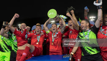 Shels Skipper Luke Byrne lifts the Airtricity League First Division trophy